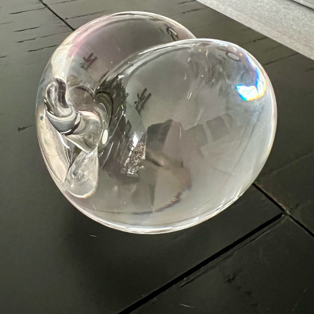 Tiffany & Co. “Georgia Peach” solid crystal paper weight.